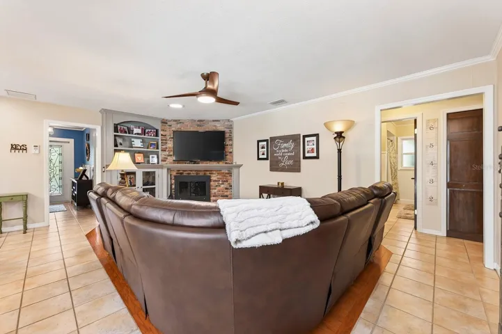 Gather with family or entertain friends in the comfortable family room, open to the kitchen.