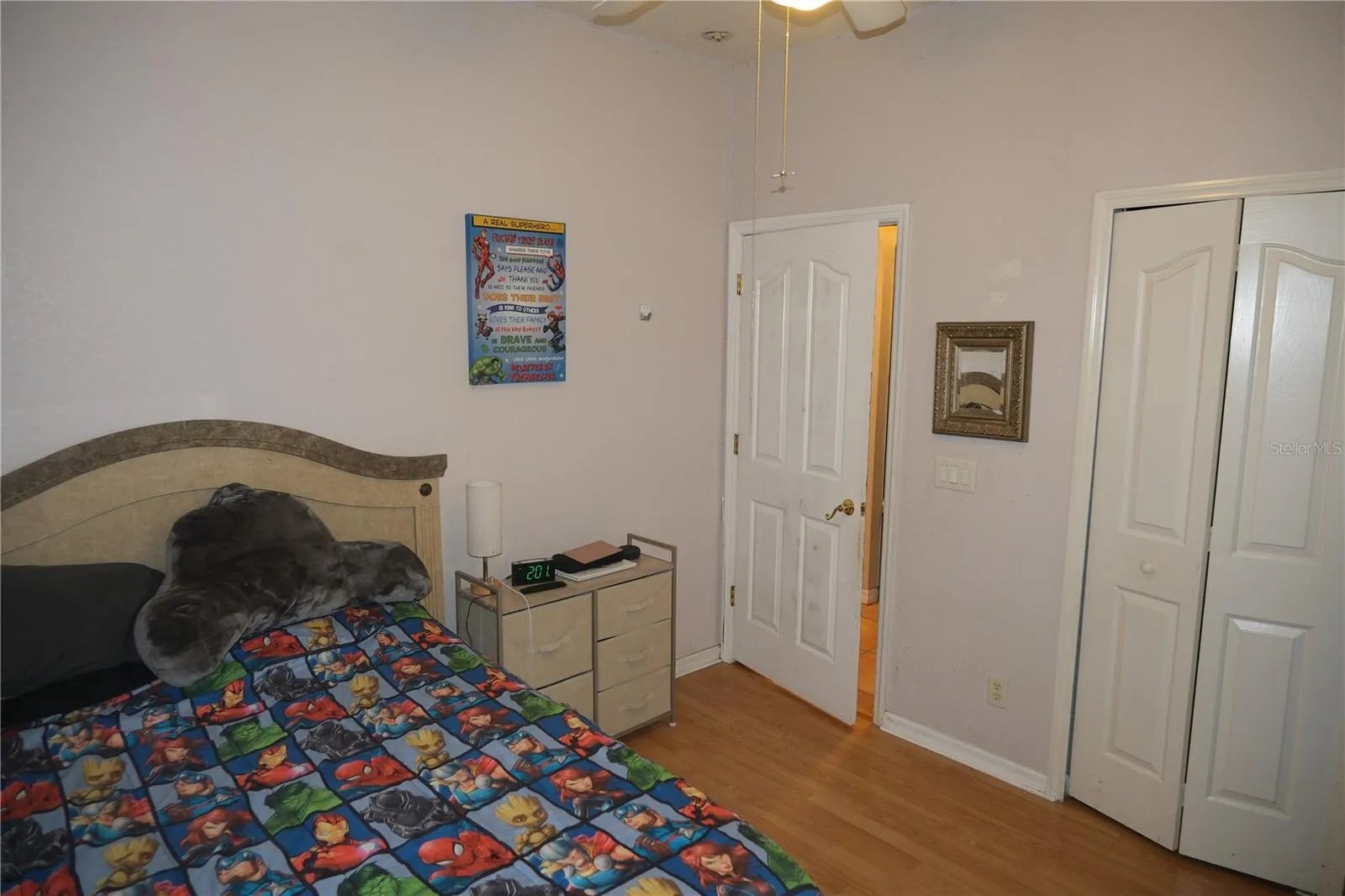 Third bedroom with view of closet