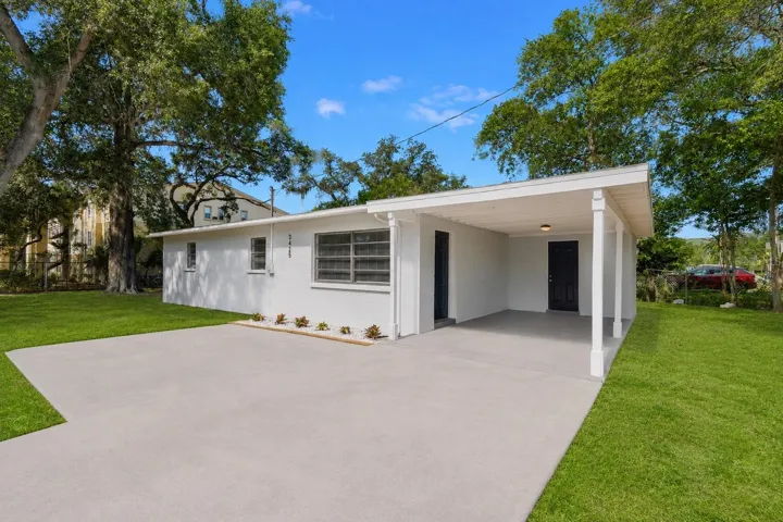 Front with entry door and laundry room door
