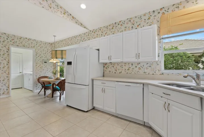 Kitchen with Wood Cabinets and Quartz Countertops