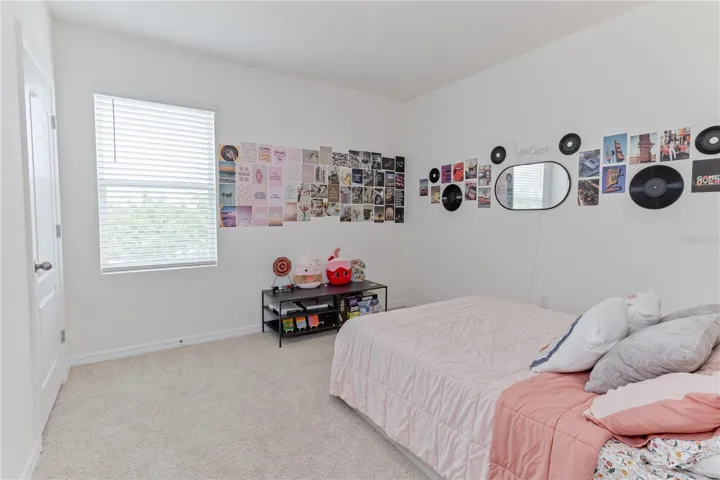 Secondary bedroom with ample natural light and comfortable layout.