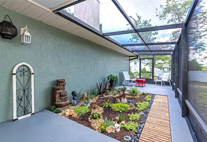 Screened Lanai with custom garden area