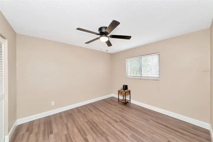 bedroom 3 with vinyl flooring