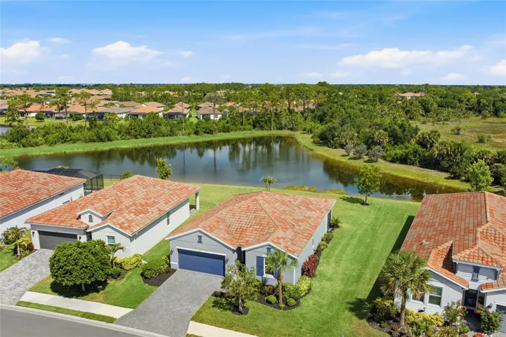 Beautiful premier water-view Lot with preserve behind it and with extra space between the homes.