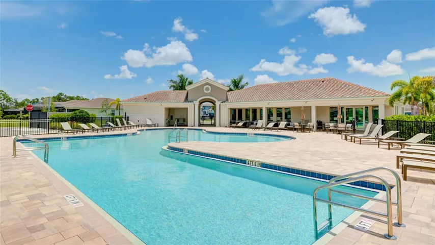 Resort Style Pool with Lap Lane and lounge chairs on the pool deck