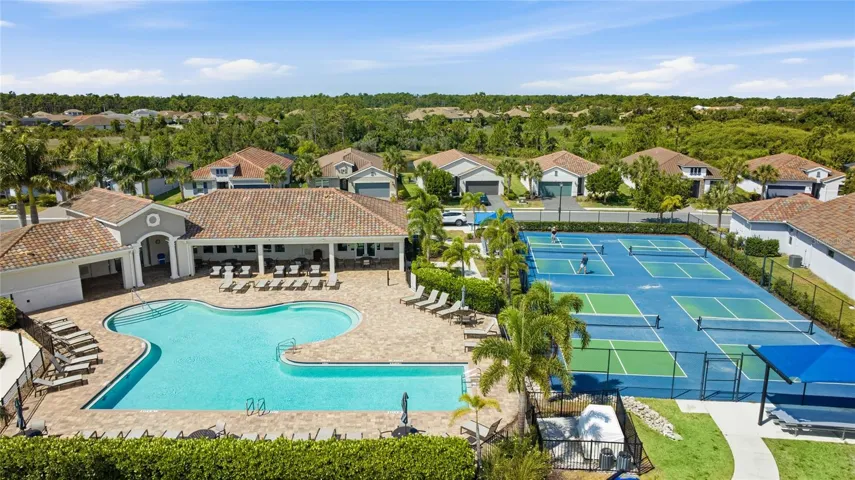 Venice Woodlands Clubhouse, Resort style Pool with lap lanes, Pickleball and Bocce Courts and Fitness Center.