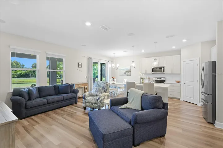 Open Floor-plan with Kitchen and Great Room overlooking the Lanai with breathtaking expansive water and preserve view from every angle.