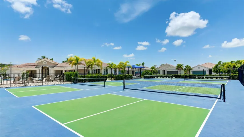 Four Pickleball Courts with covered spectator seating.