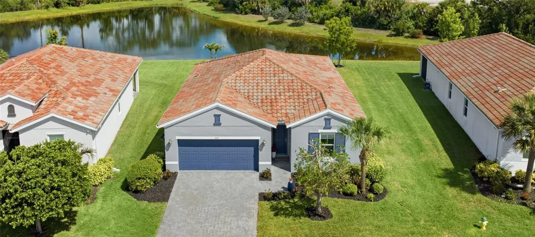 Beautiful premier water-view Lot with preserve behind it and with extra space between the homes.