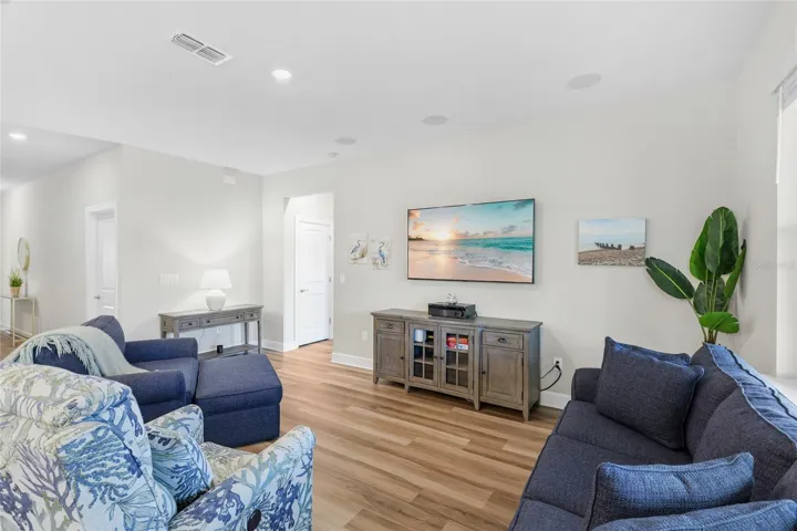 Open Floor-plan with Kitchen and Great Room overlooking the Lanai with breathtaking expansive water and preserve view from every angle.