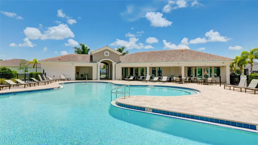 Resort Style Pool with Lap Lanes and and lounge chairs on the pool deck