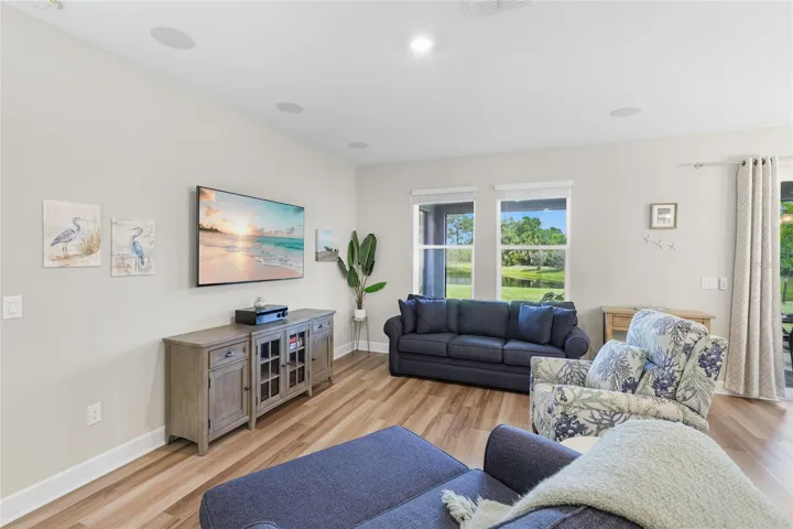 Open Floor-plan with Kitchen and Great Room overlooking the Lanai with breathtaking expansive water and preserve view from every angle.