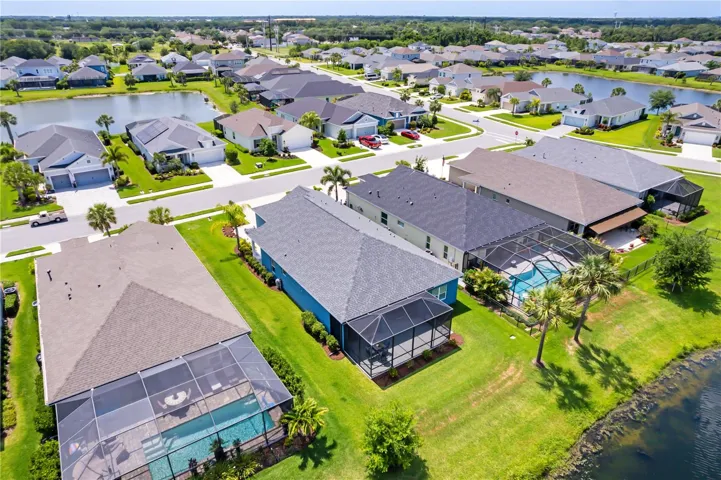 Resort-Style Community SettingThe aerial views capture the beauty of this well-maintained Florida community with tropical landscaping, water features, and thoughtfully designed homes. Conveniently located near shopping, golf, dining, Gulf beaches, and major commuter routes, this neighborhood delivers both lifestyle and location.