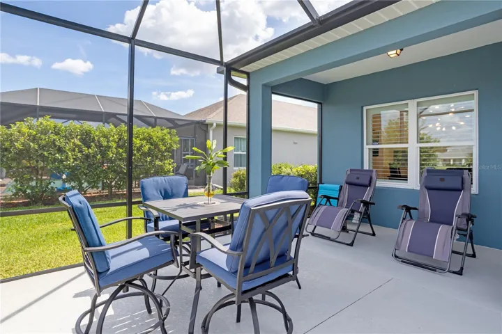 Enjoy relaxing pond views from the expansive screened patio in Silverleaf.