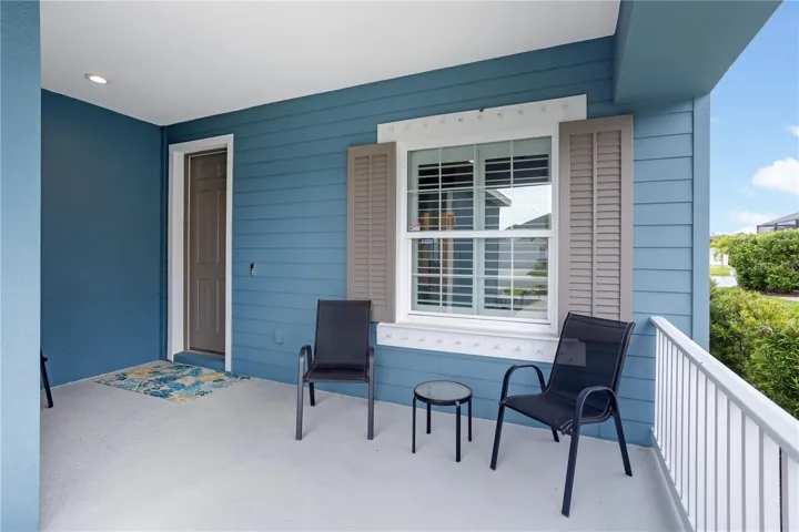 Covered Front PorchWelcome home to a spacious covered front porch designed for relaxing mornings, evening conversations, and enjoying Florida’s year-round outdoor lifestyle.