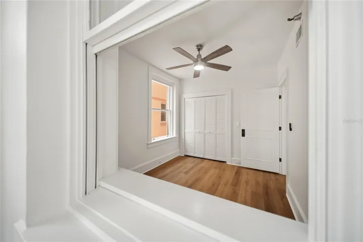 View into bedroom from sunroom