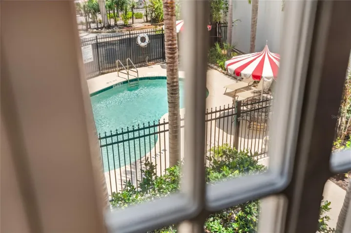 Unit 202 overlooks the pool