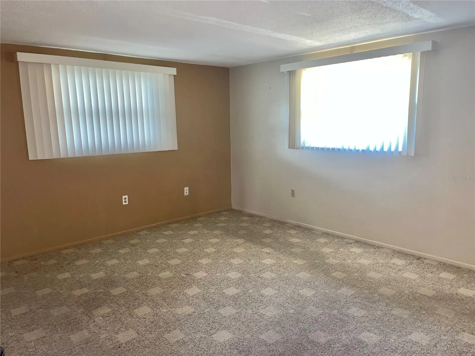 Primary bedroom with impact windows