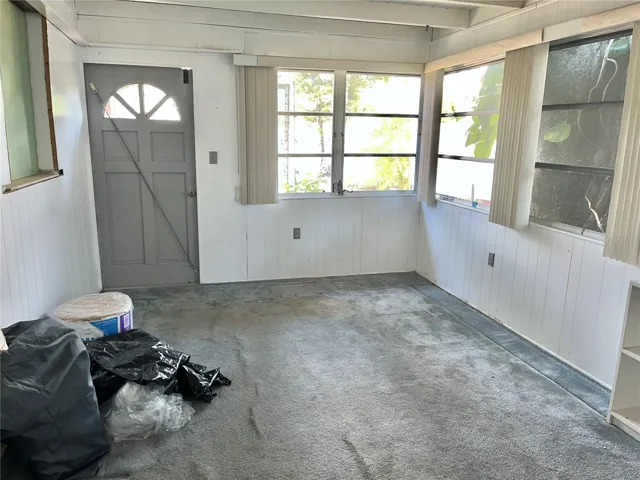 Sun room with side entry.