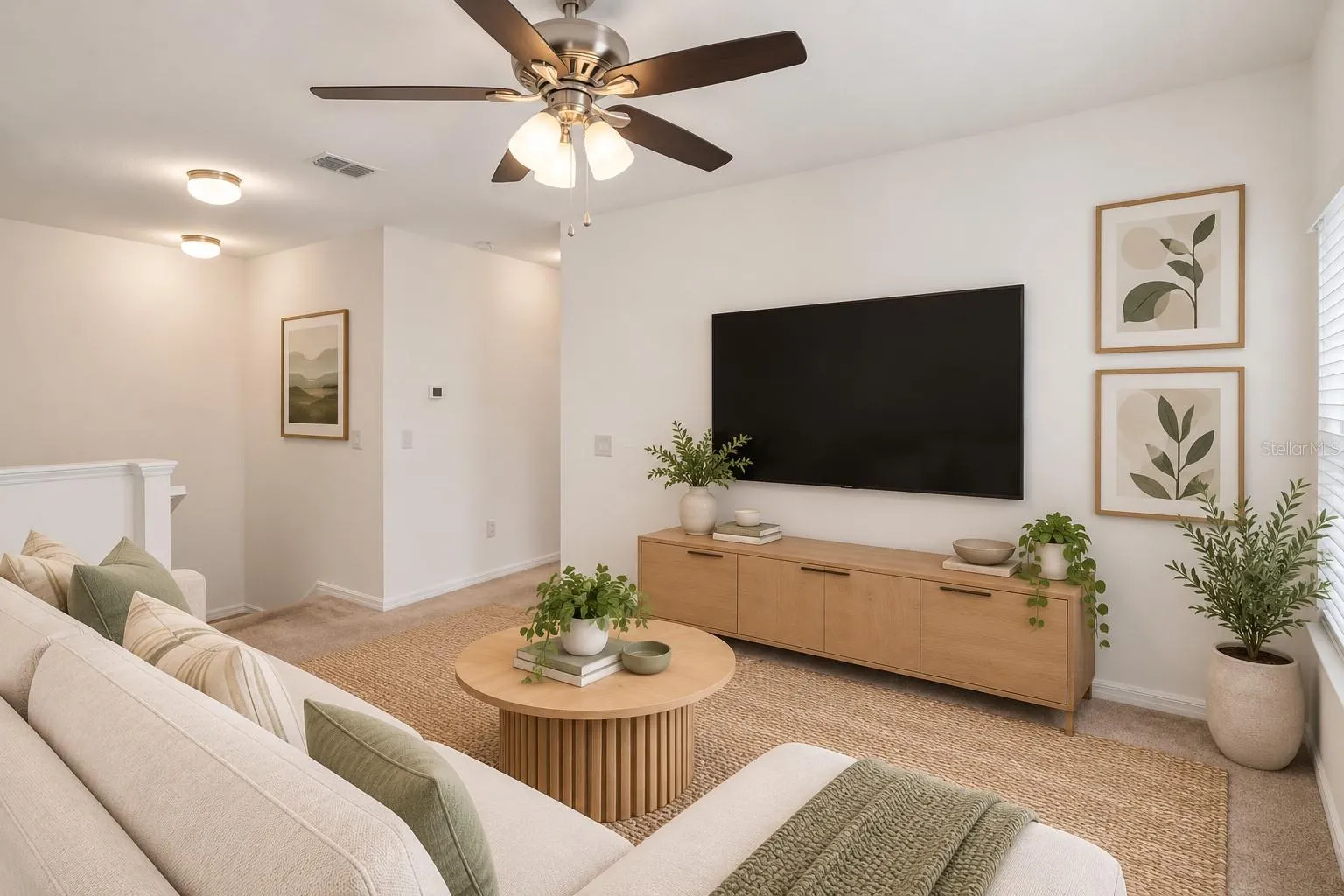 Versatile upstairs loft provides additional living space ideal for a media room, home office or casual lounge.