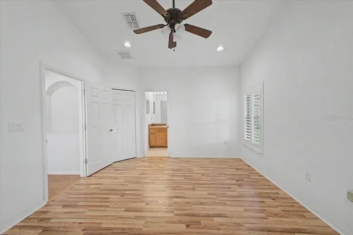 Primary Bedroom to Walk in Closet and Bathroom