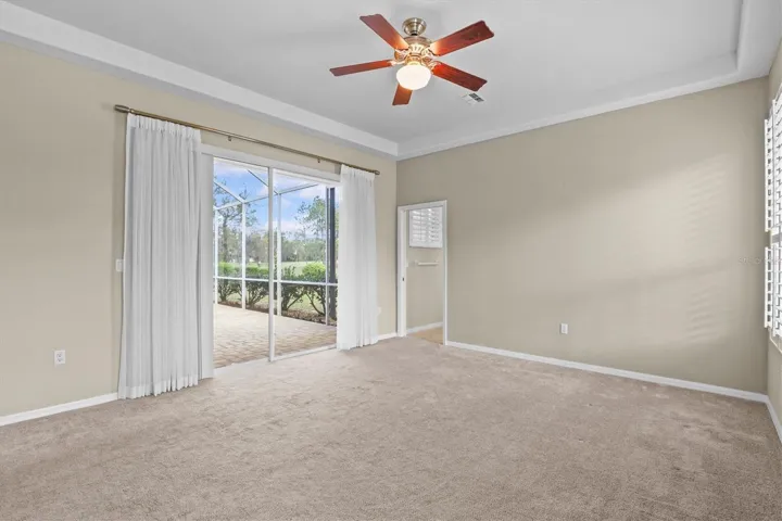 Sliders to Screened Enclosure from Primary Bedroom