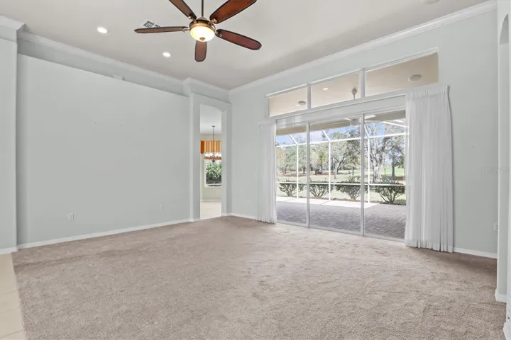 Living Room with Sliders to Screened Enclosure