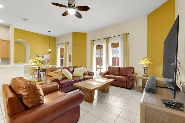 Living Room features sliding glass doors for easy access to porch.