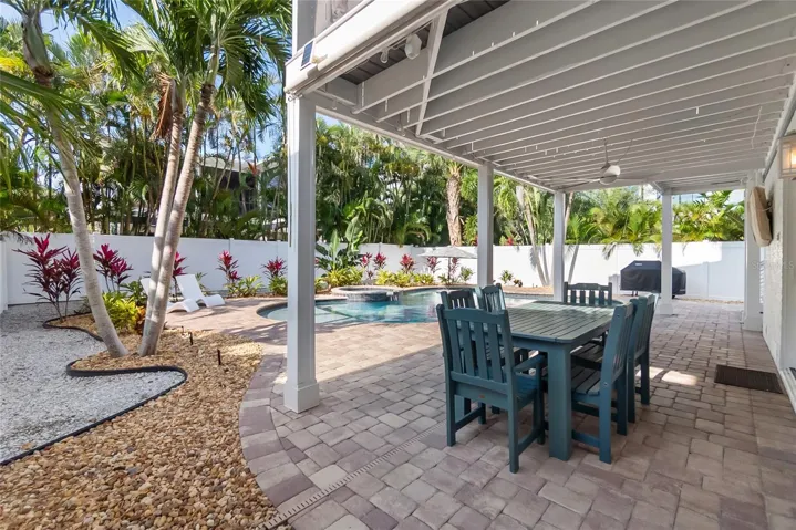 Beautifully maintained pavered pool deck