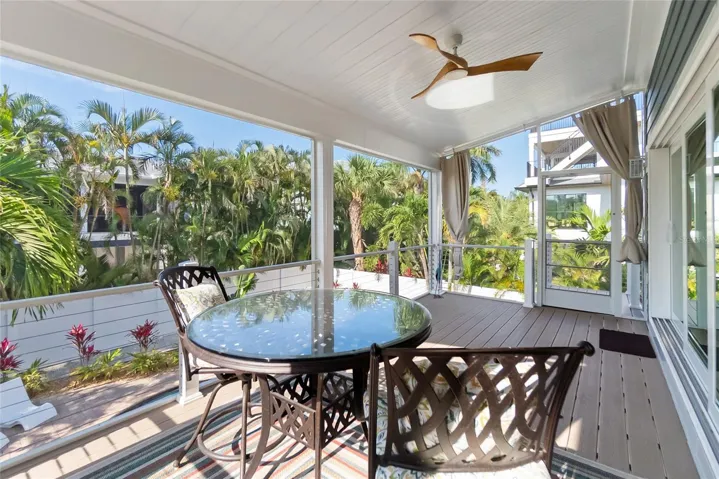 Rear Deck overlooks pool/spa with access to ground floor