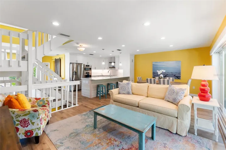 Corner of Living Room in towards Kitchen and Dining Area
