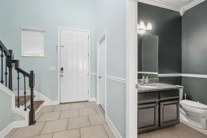 Entryway with guest bathroom