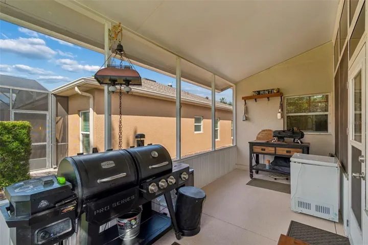 Covered and screened grilling room