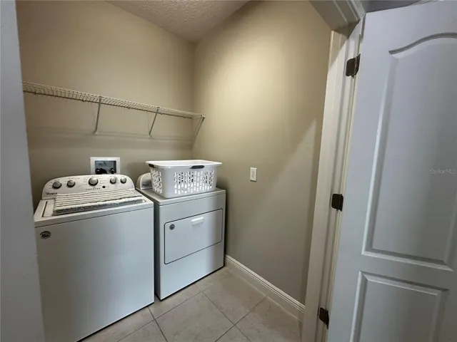 Laundry room with washer and dryer.