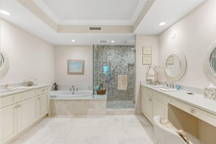 This is the primary bathroom with a separate water closest and separate vanities