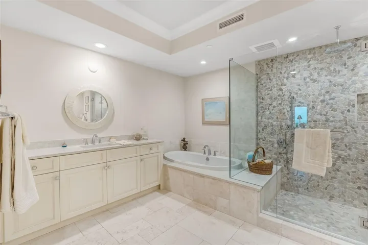 The primary bathroom offers ample countertop space.