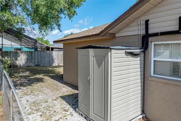Inside this shed is a large solar heated hot water heater.  SELLERS HAVE PAID OFF THE PANELS.