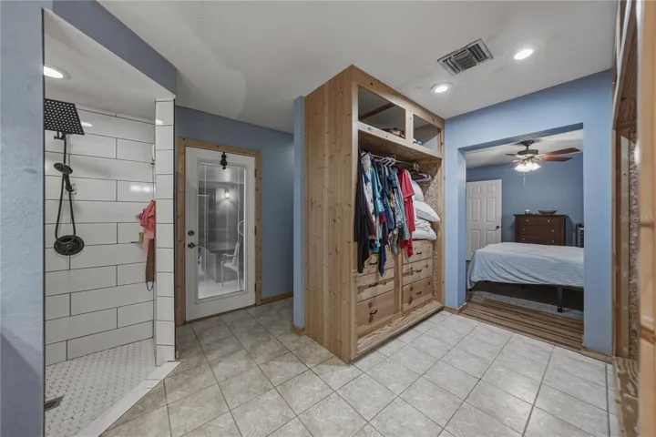 This view shows the second closet/storage in the ensuite.