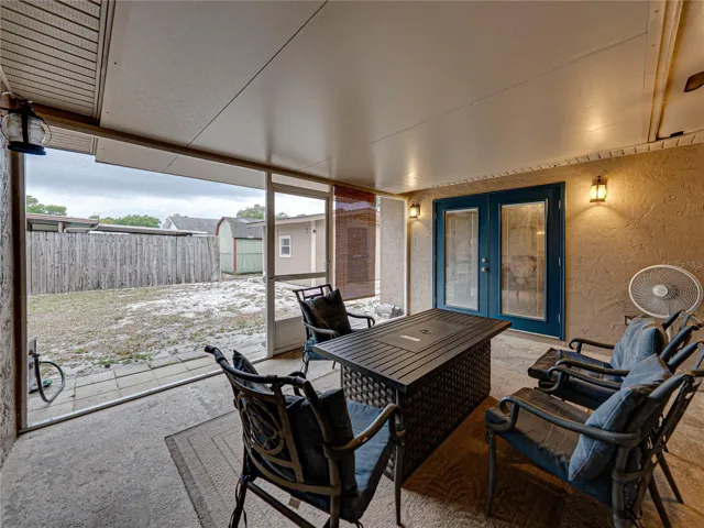 The screened porch has an insulated ceiling that can be seen in this picture.