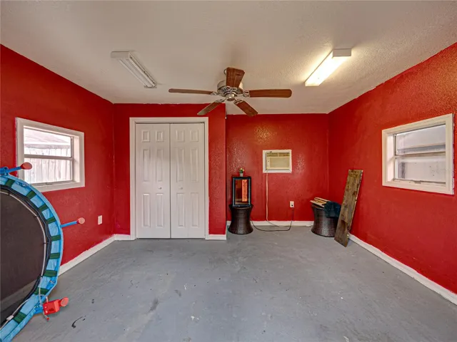 Inside a/c shed.