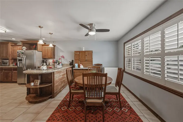 Dining room.  Beautiful shutters add a special touch to the room.