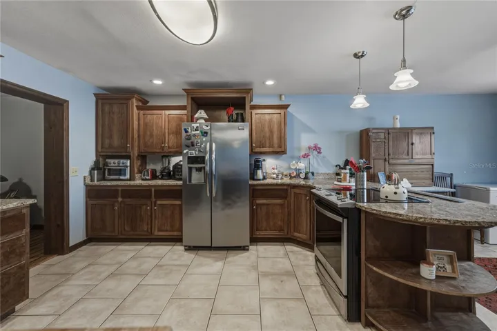Loads of counterspace and cabinets are in the remodeled kitchen.
