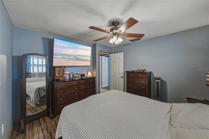 Another view of the primary bedroom.