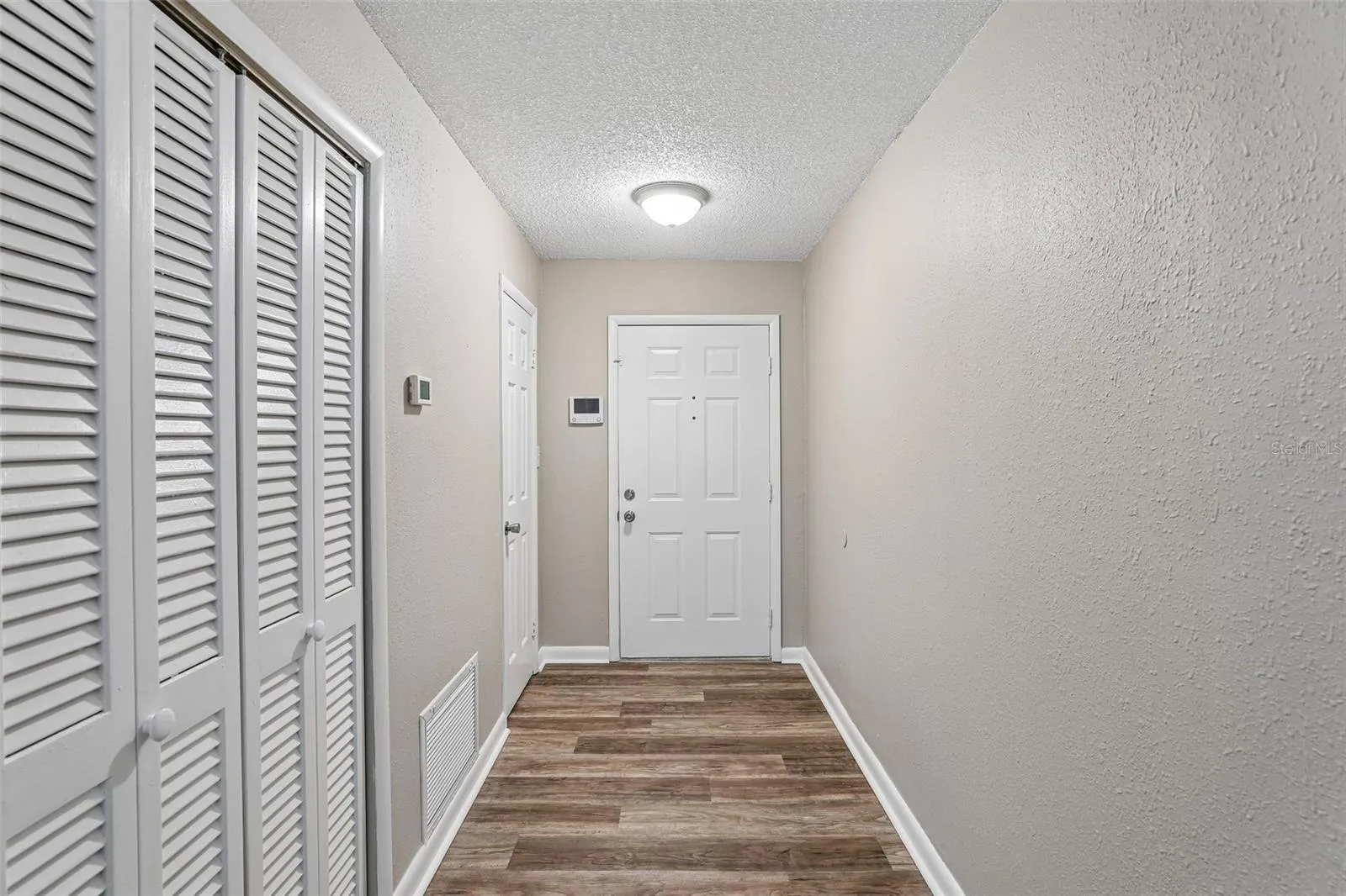 Louvered doors are where the HVAC &amp; Water heater are located.