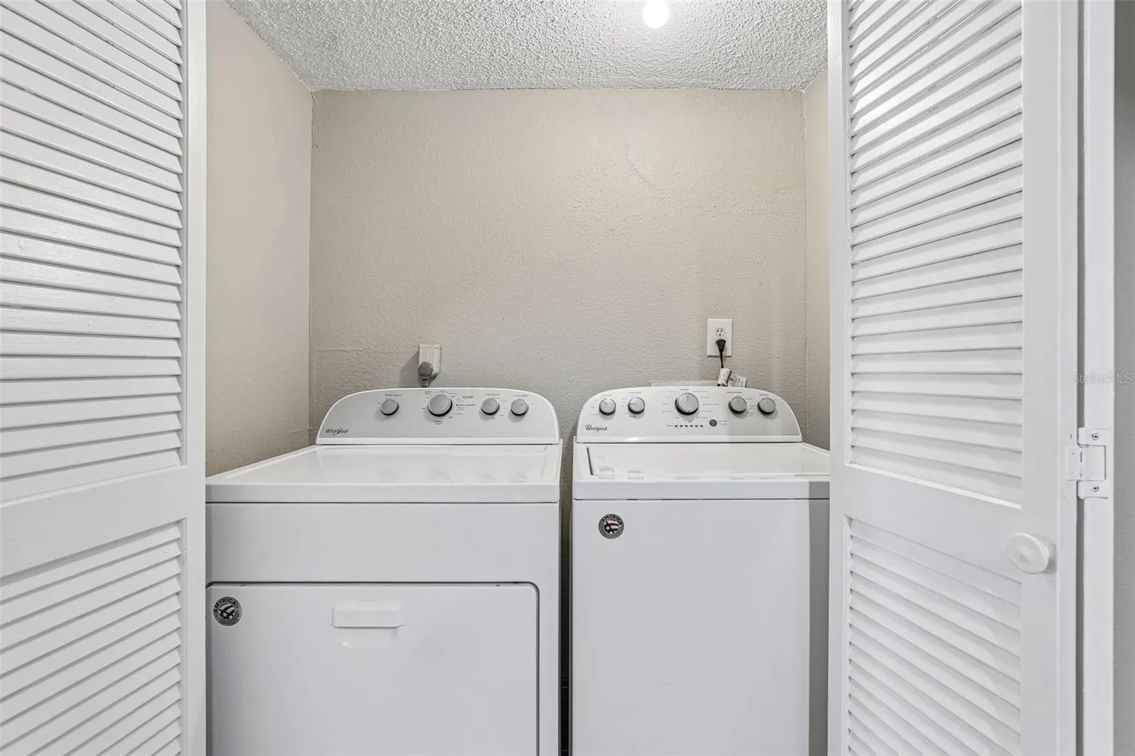 Washer &amp; dryer closet inside the condo