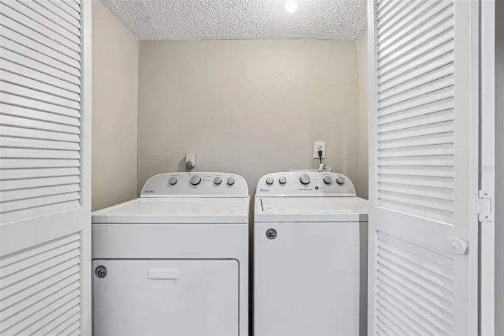 Washer & dryer closet inside the condo