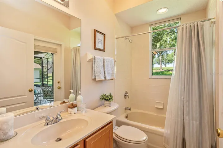 Guest Bathroom 3 w/Door Access to Patio