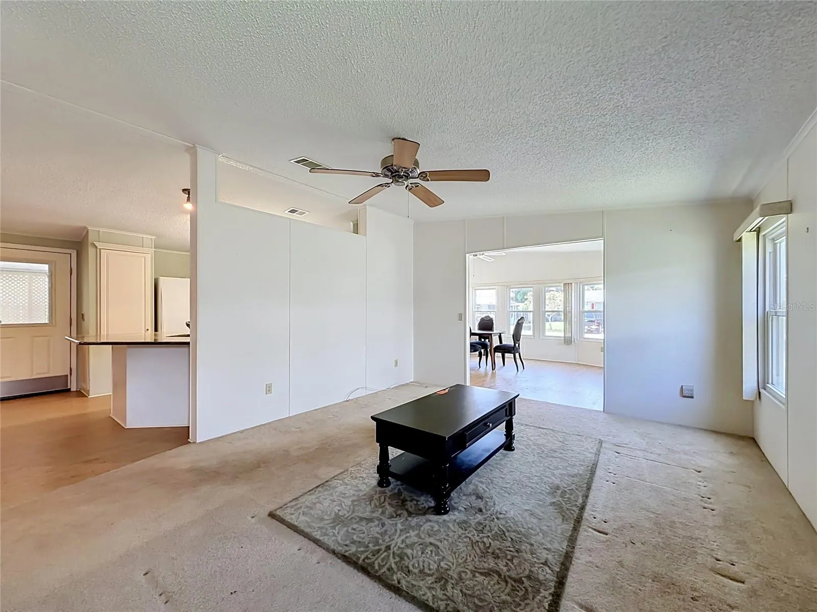 Living Room open to Kitchen and Dining Room