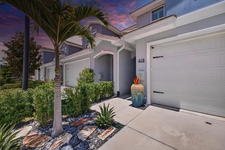 Lush Landscaping Provides Privacy to Front Entrance
