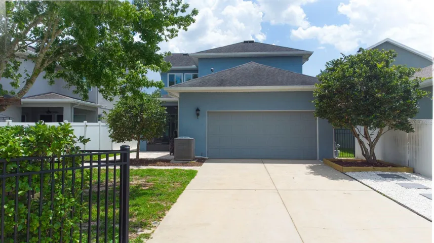 Gated entrance to the rear facing garage